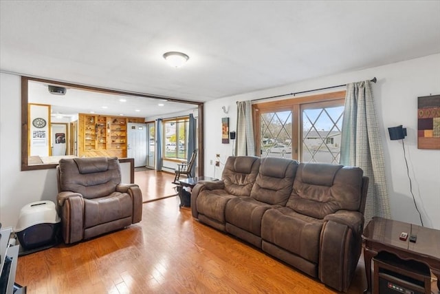 living room with wood finished floors