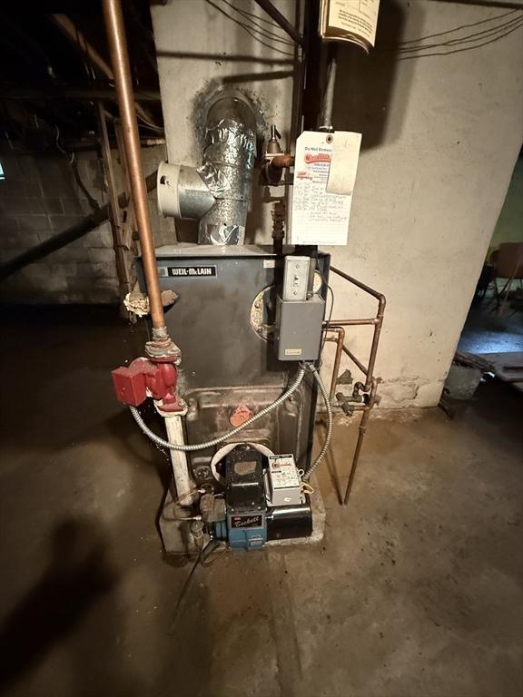 utility room with a heating unit