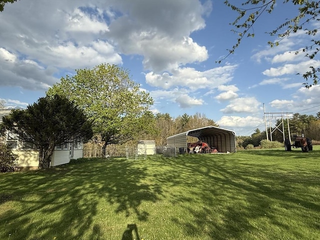 view of yard featuring a detached carport