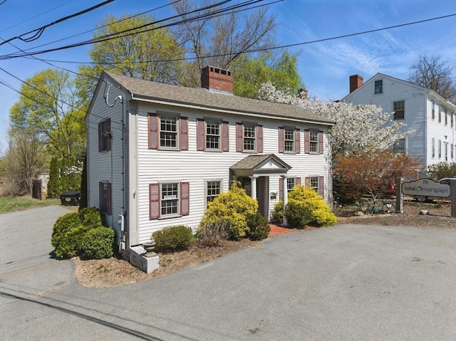 colonial home with a chimney
