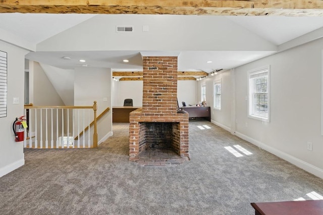 recreation room featuring lofted ceiling, carpet floors, and visible vents