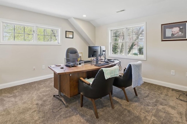 carpeted home office featuring visible vents, baseboards, and a healthy amount of sunlight