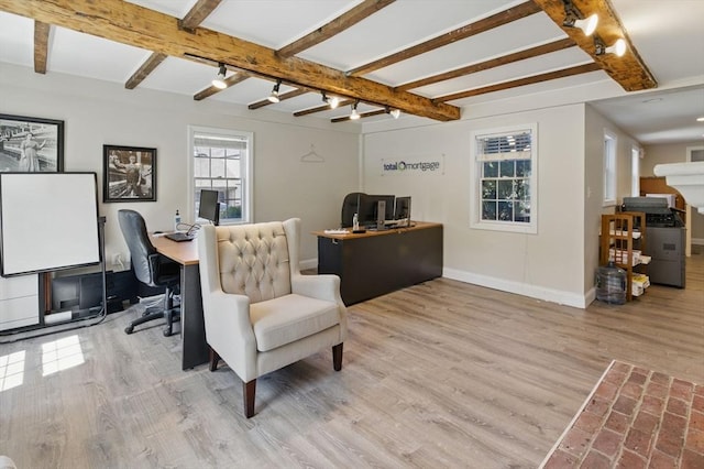 home office featuring wood finished floors, baseboards, and beamed ceiling