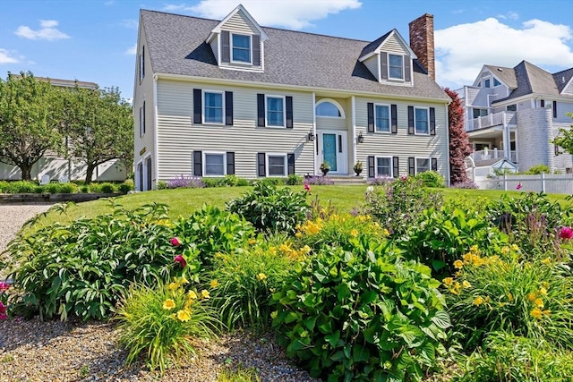 5 Cliff Estates Rd, Scituate, MA 02066 - view of front of home with a chimney and a shingled roof