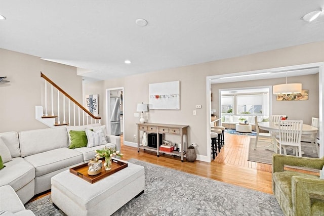5 Cliff Estates Rd, Scituate, MA 02066 - living area featuring wood finished floors, stairway, and recessed lighting