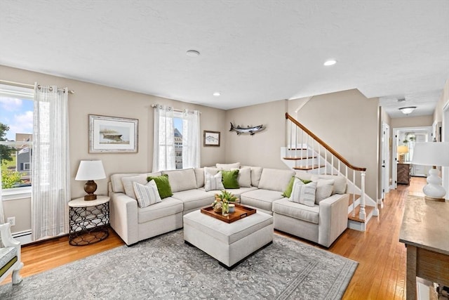 5 Cliff Estates Rd, Scituate, MA 02066 - living area featuring wood finished floors, stairway, and recessed lighting