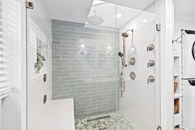 5 Cliff Estates Rd, Scituate, MA 02066 - bathroom with stacked washer / drying machine, a stall shower, and tile patterned floors