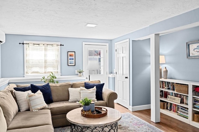 5 Cliff Estates Rd, Scituate, MA 02066 - living area with wood finished floors and a textured ceiling