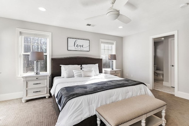 carpeted bedroom with recessed lighting, visible vents, and baseboards