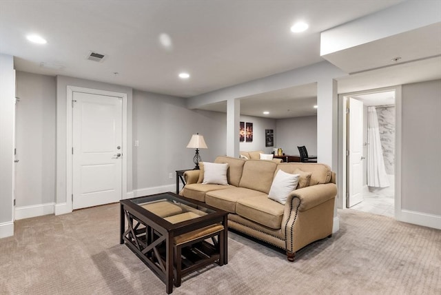 living room with light carpet, baseboards, visible vents, and recessed lighting