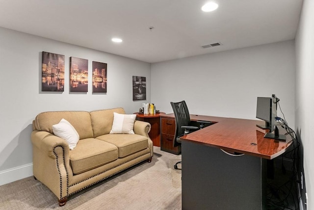 office featuring baseboards, recessed lighting, visible vents, and light colored carpet