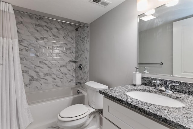 bathroom with toilet, shower / bath combo, visible vents, and vanity