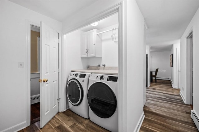 10 High Ridge Rd, Boxford, MA 01921 - laundry room with cabinet space, separate washer and dryer, dark wood-type flooring, baseboard heating, and a baseboard heating unit