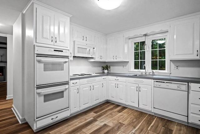 10 High Ridge Rd, Boxford, MA 01921 - kitchen with white appliances, dark wood-style flooring, white cabinetry, and dark countertops