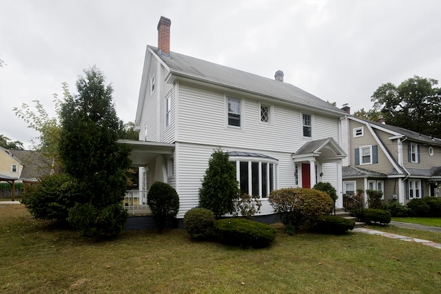 view of front of home with a front yard