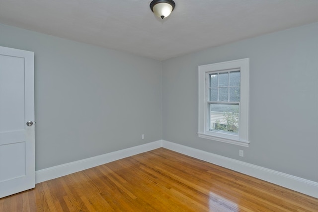 spare room featuring light wood-type flooring