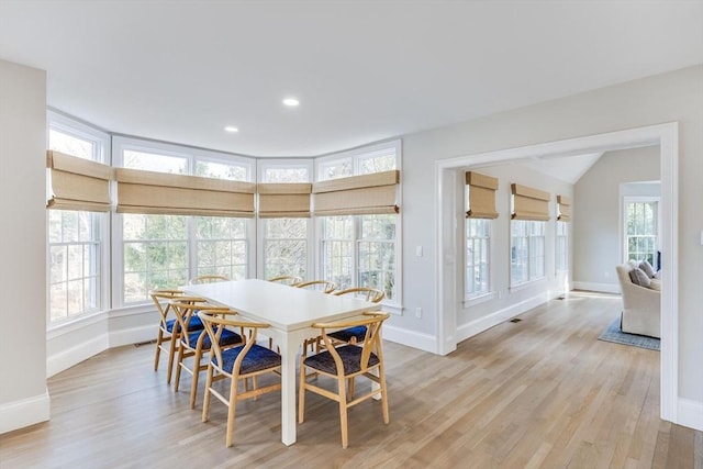 7 Colonial Dr, Chatham, MA 02633 - dining space featuring baseboards, light wood finished floors, and recessed lighting