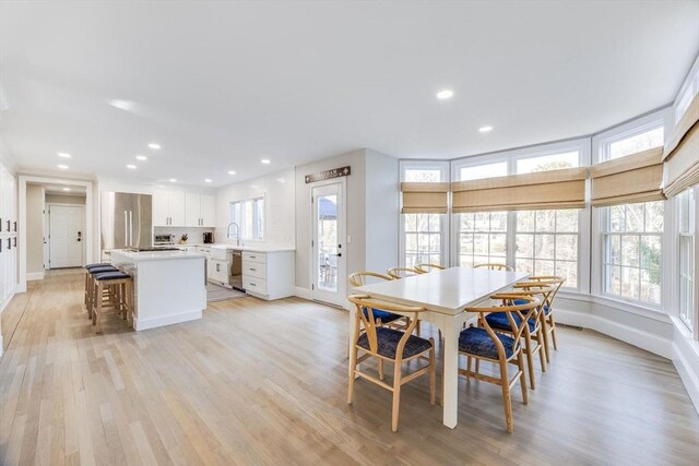 7 Colonial Dr, Chatham, MA 02633 - dining area with light wood-style floors, baseboards, and recessed lighting