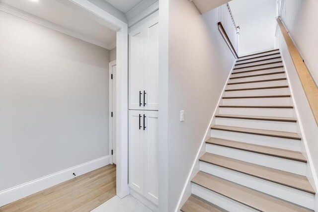 7 Colonial Dr, Chatham, MA 02633 - stairway with wood finished floors and baseboards