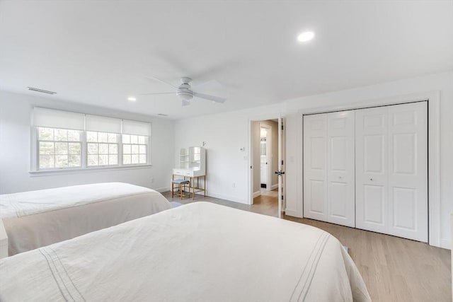 7 Colonial Dr, Chatham, MA 02633 - bedroom with light wood-style floors, recessed lighting, ceiling fan, baseboards, and a closet