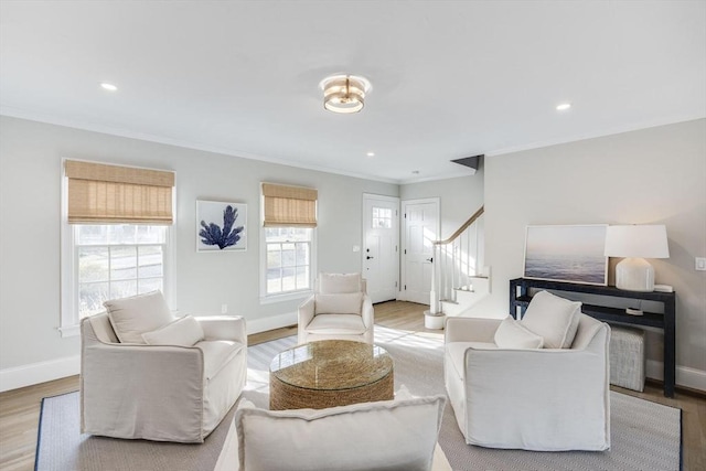 7 Colonial Dr, Chatham, MA 02633 - living room with stairway, ornamental molding, wood finished floors, baseboards, and recessed lighting