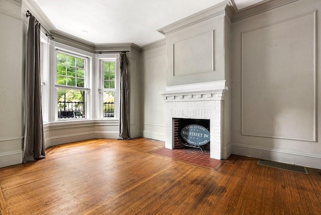 58 Thomas Park, Boston, MA 02127 - unfurnished living room featuring wood finished floors, a fireplace, and ornamental molding