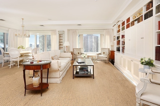 living room with ornamental molding, a chandelier, and light colored carpet