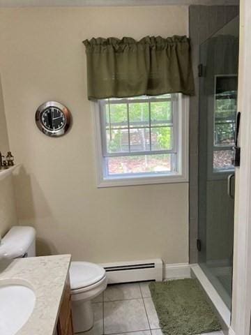 10 Atherton Rd, Hudson, MA 01749 - full bath featuring a baseboard radiator, vanity, a stall shower, toilet, and tile patterned floors