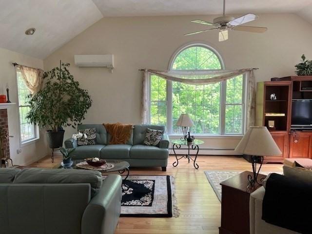 10 Atherton Rd, Hudson, MA 01749 - living room with an AC wall unit, vaulted ceiling, a baseboard radiator, light wood-type flooring, and ceiling fan
