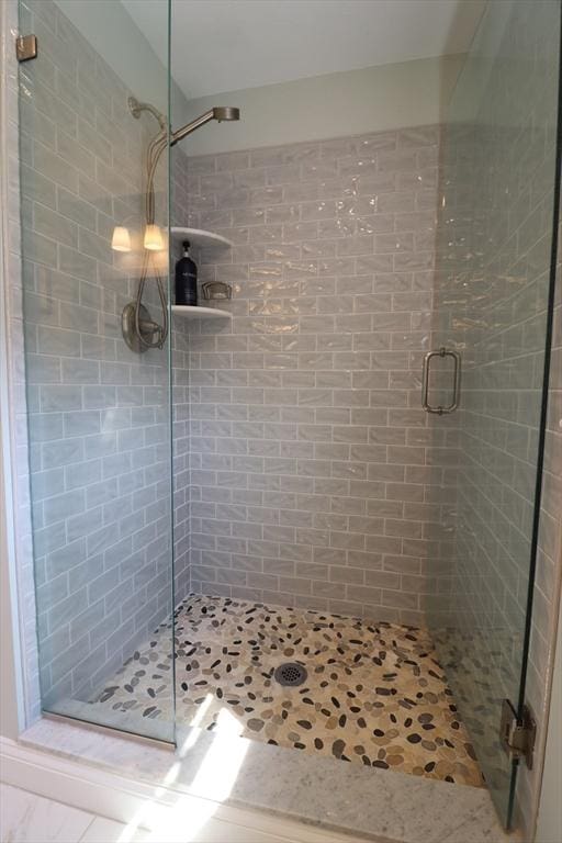 full bathroom with a stall shower