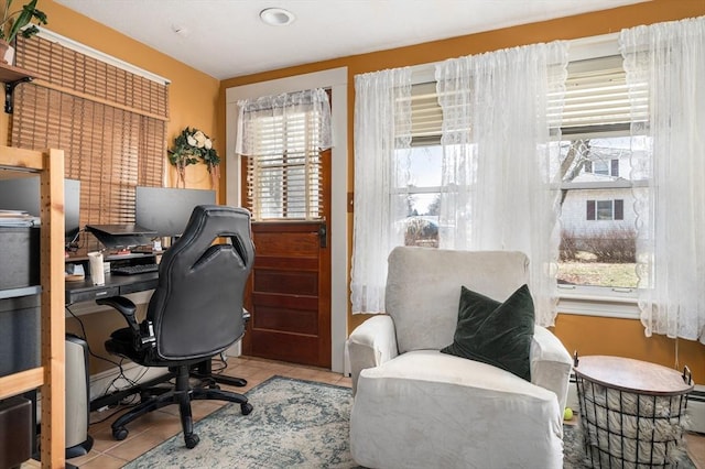 office area with tile patterned floors