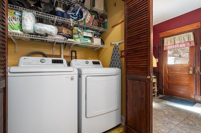 clothes washing area with laundry area and washing machine and dryer