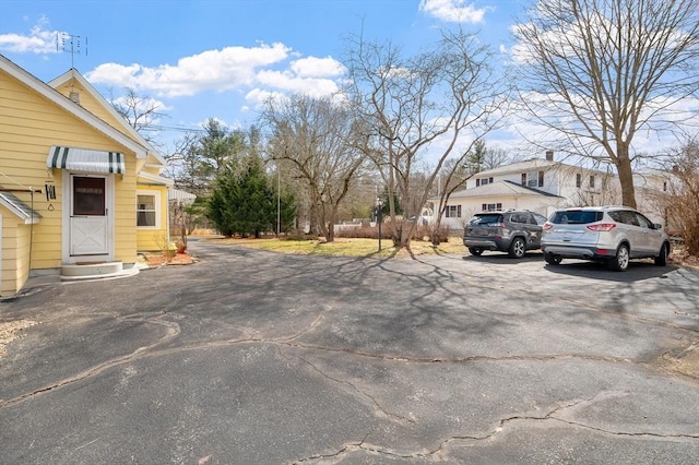 view of parking / parking lot with entry steps