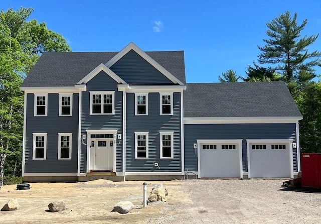 38 John Perkins Way, Middleboro, MA 02346 - colonial home featuring a garage, dirt driveway, and entry steps