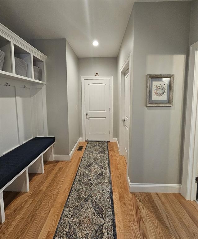 38 John Perkins Way, Middleboro, MA 02346 - mudroom featuring baseboards and light wood finished floors