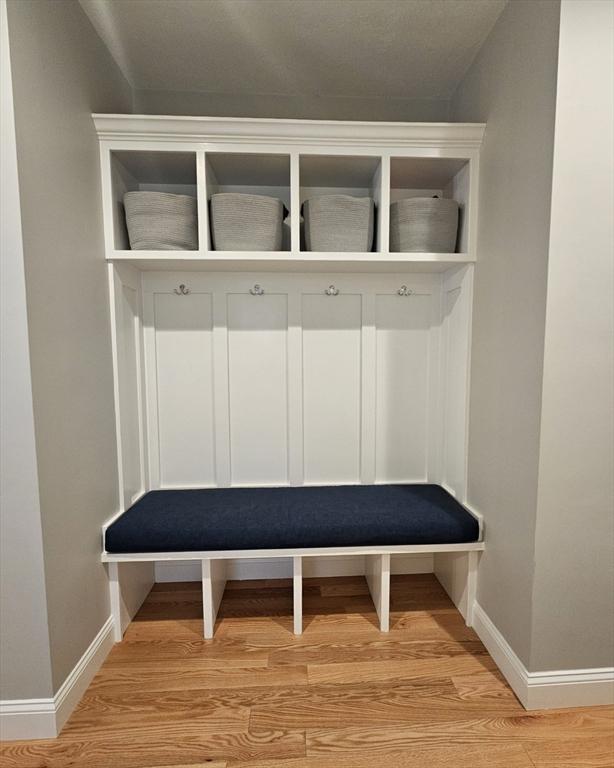 38 John Perkins Way, Middleboro, MA 02346 - mudroom featuring baseboards and light wood-type flooring