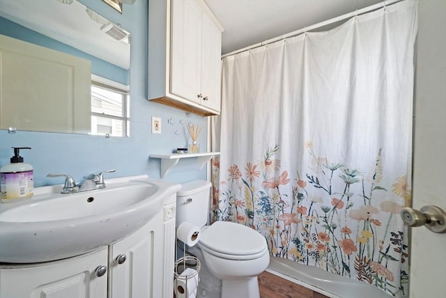22 Mcarthur Ln, Marshfield, MA 02050 - bathroom featuring vanity, toilet, curtained shower, and wood finished floors