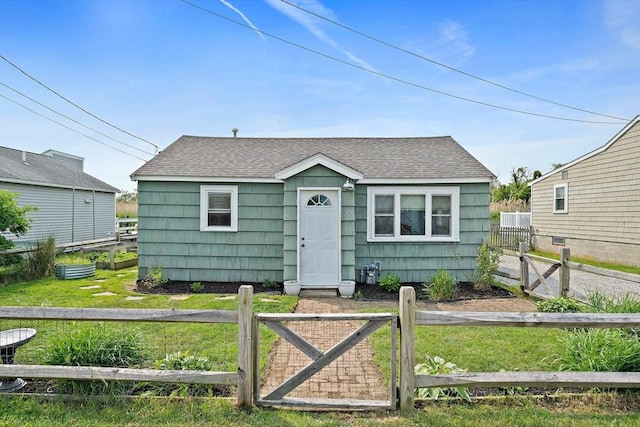 22 Mcarthur Ln, Marshfield, MA 02050 - view of front facade featuring a shingled roof and a gate