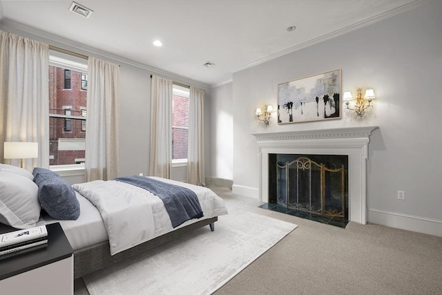 carpeted bedroom with ornamental molding