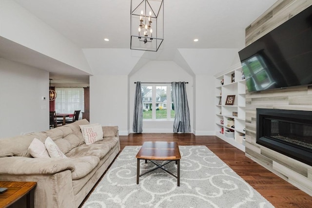 living area with a chandelier, wood finished floors, lofted ceiling, and recessed lighting