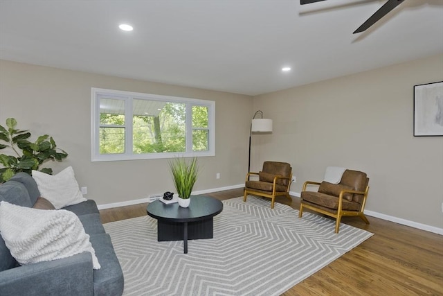 24 Old Jarvis Ave, Holyoke, MA 01040 - living area with wood finished floors, baseboards, recessed lighting, and a ceiling fan
