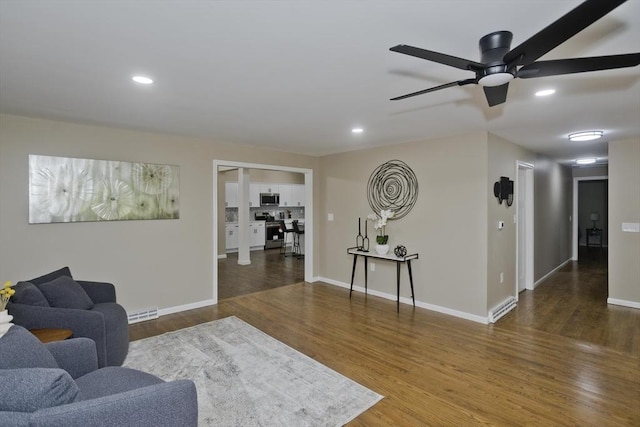 24 Old Jarvis Ave, Holyoke, MA 01040 - living area featuring wood finished floors, a ceiling fan, baseboards, and recessed lighting