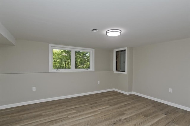 24 Old Jarvis Ave, Holyoke, MA 01040 - unfurnished room featuring wood finished floors and baseboards