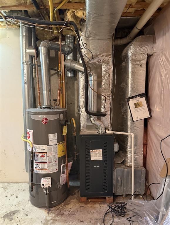 utility room with water heater