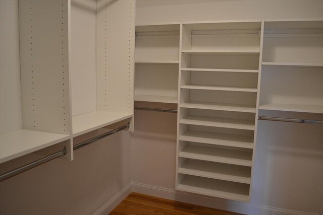 28 Barrows St, Norton, MA 02766 - spacious closet featuring dark wood-style flooring