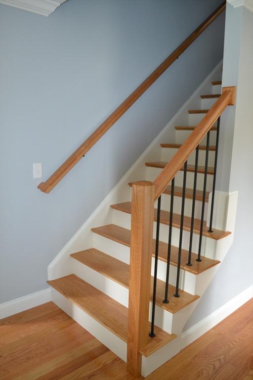 28 Barrows St, Norton, MA 02766 - staircase featuring baseboards and wood finished floors