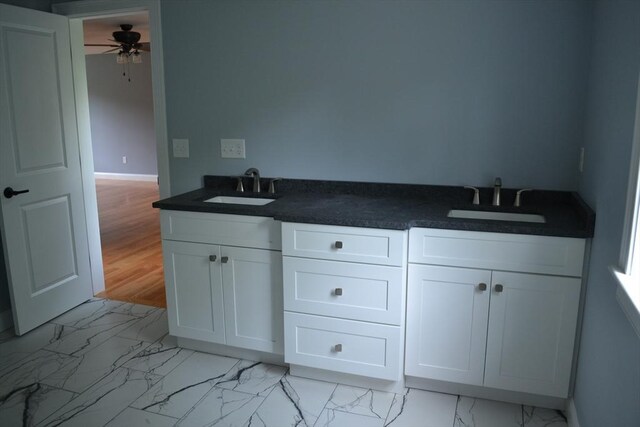 28 Barrows St, Norton, MA 02766 - full bathroom featuring marble look tile flooring, double vanity, and a ceiling fan