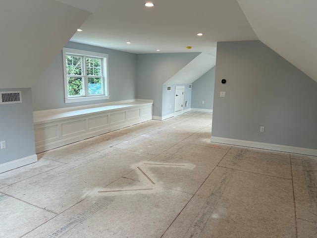 bonus room with vaulted ceiling