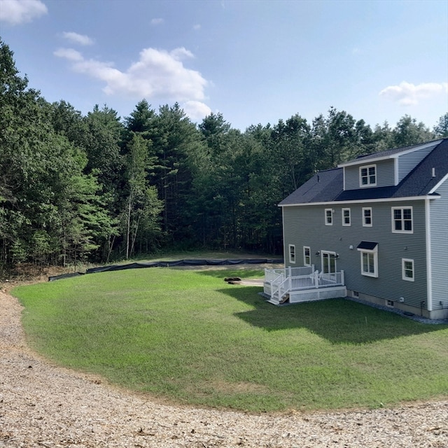 view of yard featuring a deck