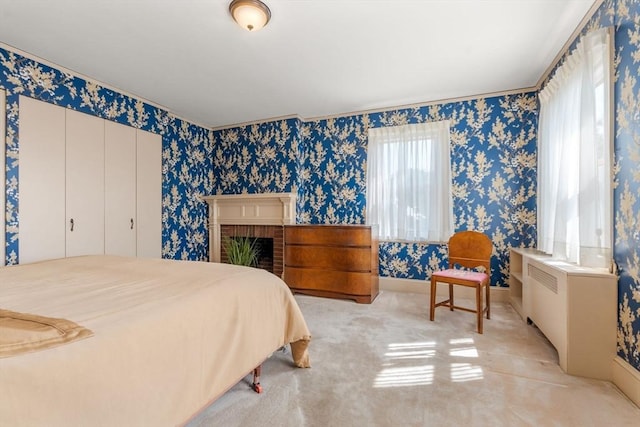 22 Adams Ave, Watertown, MA 02472 - carpeted bedroom featuring wallpapered walls, a fireplace, baseboards, and a closet